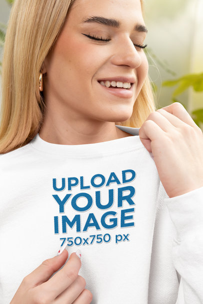 Closeup Mockup of a Smiling Woman Wearing a Gildan Sweatshirt