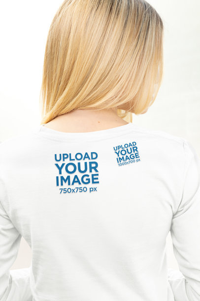Back-View Mockup of a Woman Wearing a Bella Canvas Long Sleeve Tee