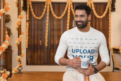 Crewneck Sweatshirt and Coffee Mug Mockup of a Happy Bearded Man Celebrating Holidays