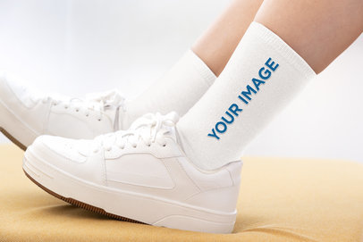 Mockup of a Person Wearing Socks With a Pair of Sneakers