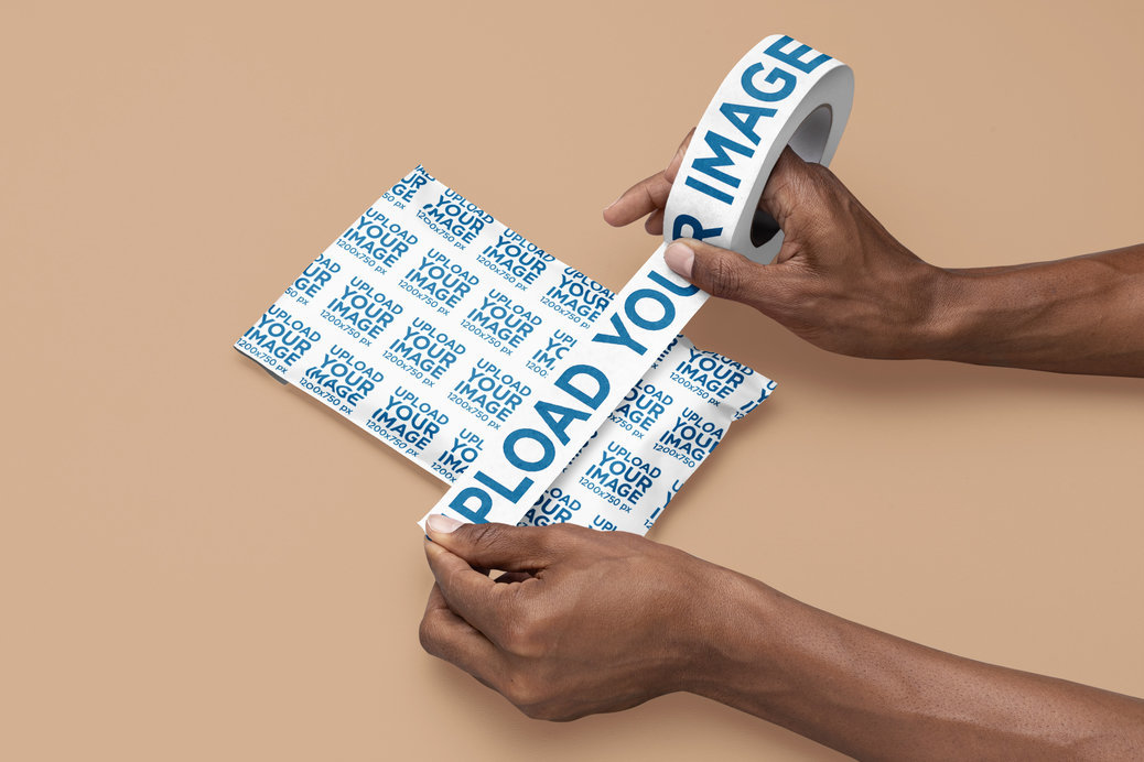 Mockup of a Man Putting a Branding Tape on a Poly Mailer