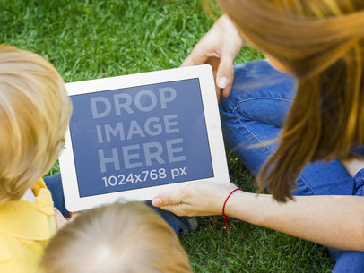 iPad Mockup Featuring a Mom with Her Children