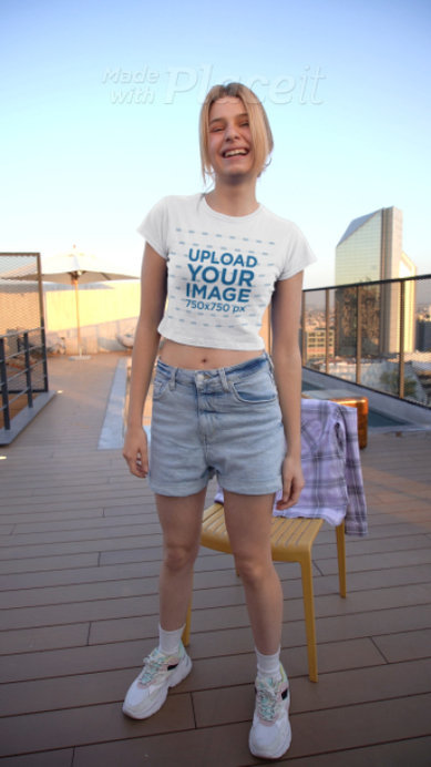 Crop Top Video of a Cheerful Woman Posing for a TikTok