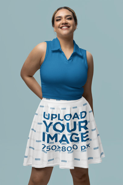 Skater Skirt Mockup Featuring a Woman Posing With a Cheerful Look in a Studio