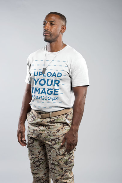 Portrait of a Veteran Wearing a Round Neck Tee Mockup in a Photo Studio