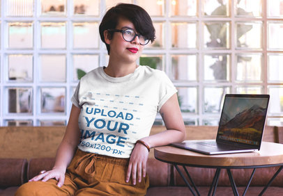 Bored Woman Wearing a T-Shirt Mockup Waiting for a Coworker a20403