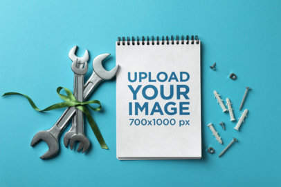 Spiral Notebook Mockup Featuring Steel Wrenches and Nails m33884 r-el2