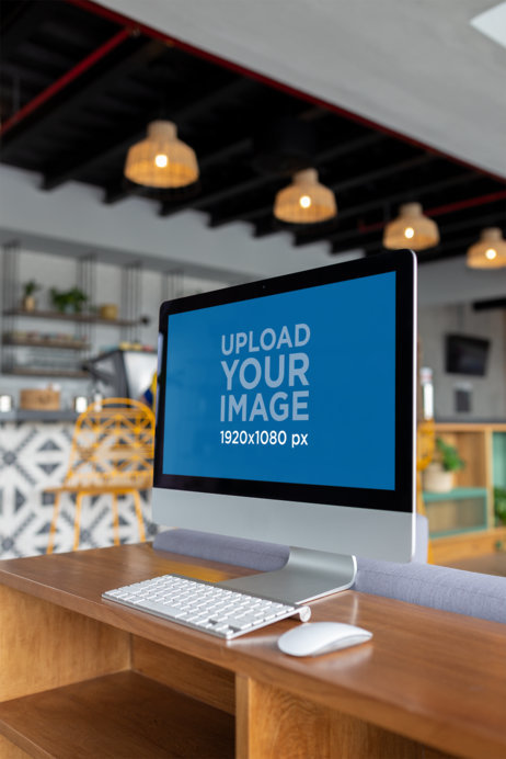 iMac Mockup Standing on a Wooden Surface