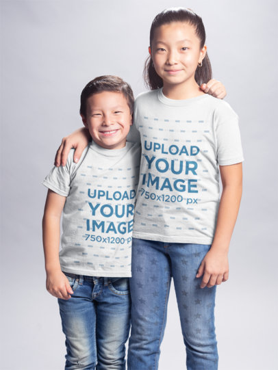 Asian Kids Wearing Tshirts Mockup Hugging at a Photo Studio