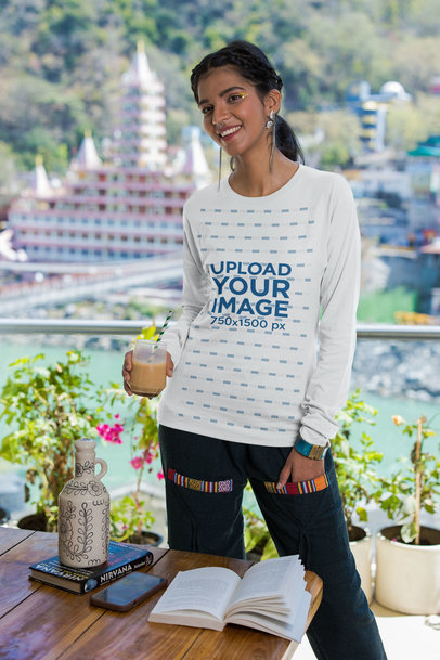 Bella Canvas Long Sleeve T-Shirt Mockup of a Woman with a Coffee and a Book