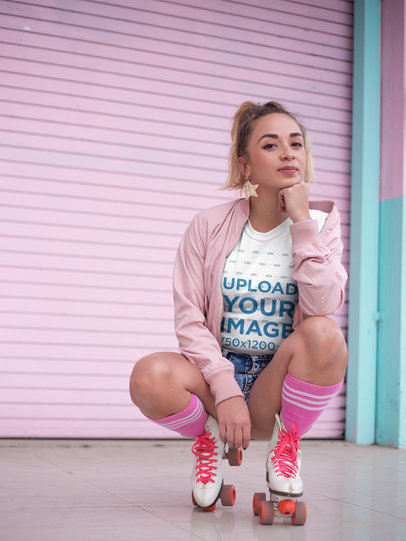 Trendy Woman with Roller Skates Wearing a T-Shirt Mockup in a Pink Environment
