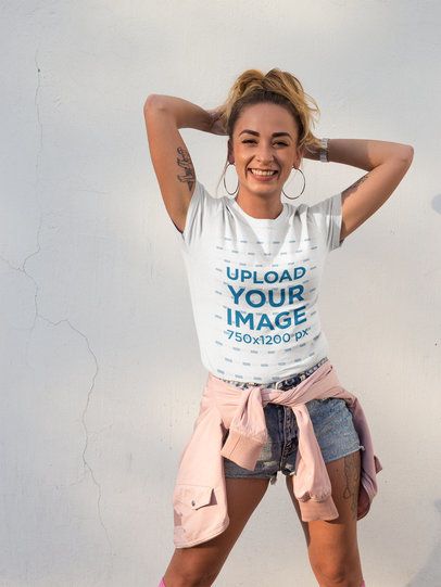 Mockup of a Trendy Hispanic Woman with Tattoos and Hoop Earrings Wearing a T-Shirt