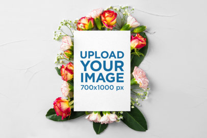 Mockup of a Wedding Program Placed Over a Bed of Flowers