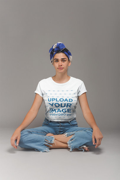 Woman with a Headwrap Wearing a T-Shirt Mockup Sitting in Lotus Position