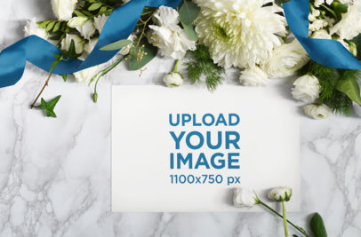 Wedding Program Mockup Featuring White Flowers with a Marble Surface