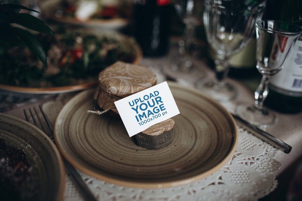 Placeit - Mockup of a Wedding Program Placed on Plate
