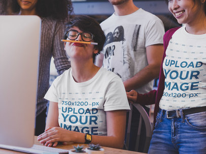 Woman Laughing at a Coworker Playing with a Pen Wearing T-Shirts Mockup