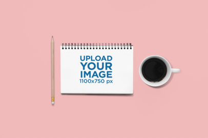 Spiral Notebook Mockup Featuring a Cup of Coffee and a Pencil