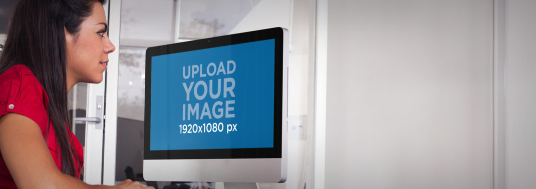 iMac Mockup Featuring a Brunette Woman Working
