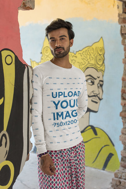 Bella Canvas Long Sleeve Tee  Mockup of a Man Leaning Against a Wall