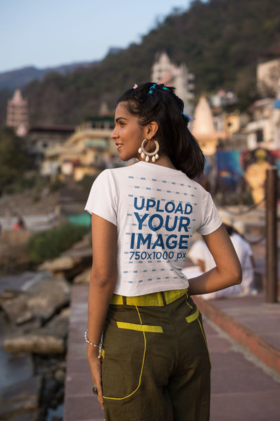 Back-View Crop Top Mockup Featuring a Woman with Big Earrings