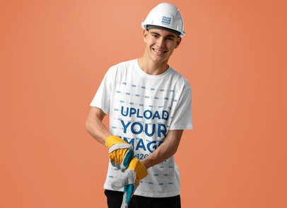 Mockup of a Young Worker Wearing a T-Shirt and a Hard Hat