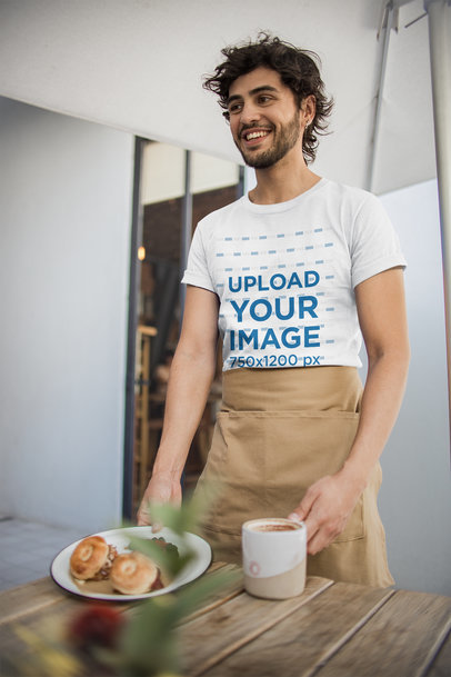 T-Shirt Mockup of a Waiter Serving his Customers a20475