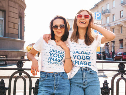 T-Shirt and Crop Top Mockup Featuring Two Sisters Posing for Siblings Day