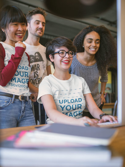 T-Shirt Mockup of Two Smiling Women with Coworkers at a Startup