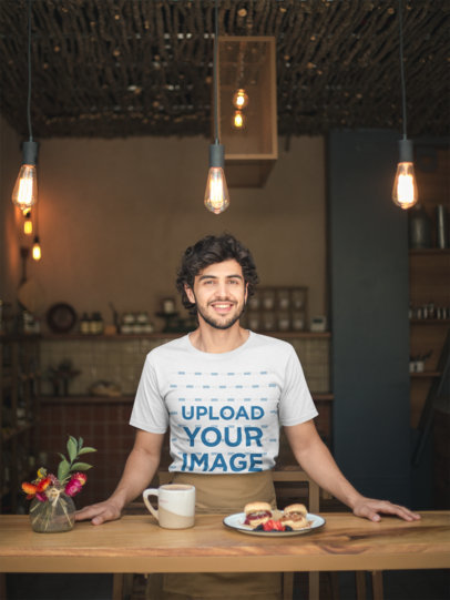 T-Shirt Mockup of a Smiling Waiter Wearing a Brown Waist Apron