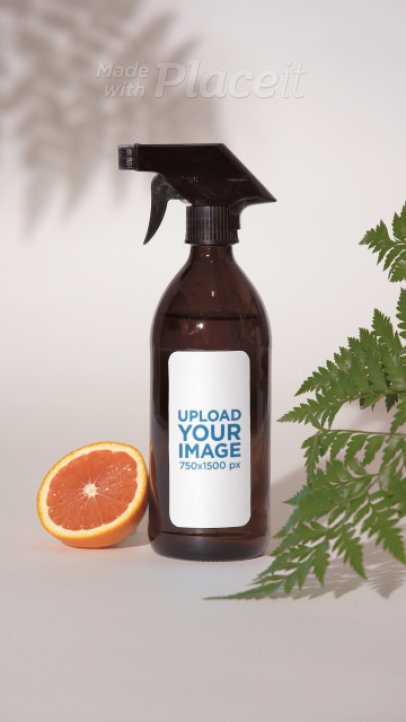 Glass Spray Bottle Video Featuring an Orange Slice and Some Leaves