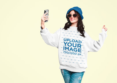 Sweatshirt Mockup of a Joyful Woman Taking a Selfie