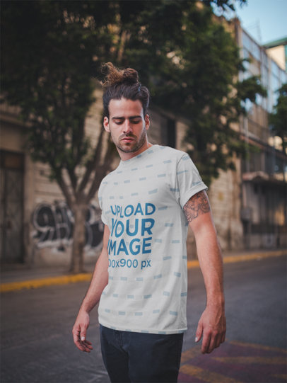 T-Shirt Mockup of Man with Manbun Walking Down the Street
