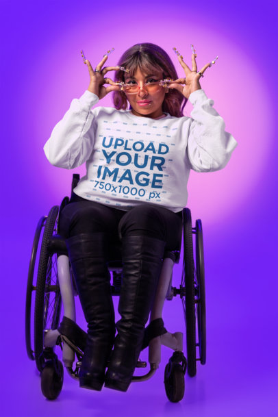 Sweatshirt Mockup of a Woman Using a Wheelchair and Posing for Pride Month