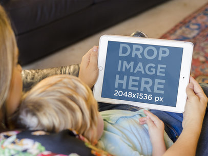 iPad Mockup Featuring a Mom and Her Baby Boy