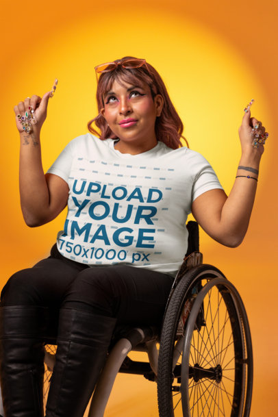 Bella Canvas T-Shirt Mockup of a Woman with Decorated Finger Nails Using a Wheelchair