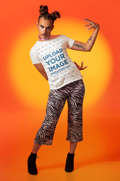 Bella Canvas T-Shirt Mockup of a Tattooed Woman Posing for a Vogue-Inspired Photoshoot