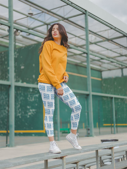 Women's Leggings Mockup of an Edgy Woman Posing at a Sports Court