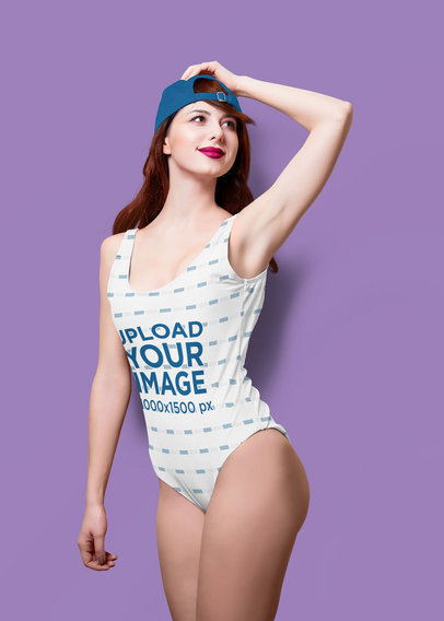 Mockup of a Woman Wearing a Sublimated Swimsuit and a Hat