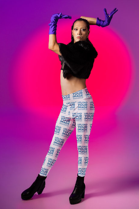 Leggings Mockup of a Woman Doing a Vogue-Inspired Look in a Studio