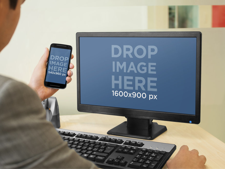 Mockup of a Man Using an Android Phone and a Windows PC