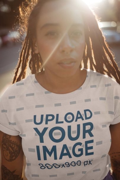 T-Shirt Mockup of a Young Woman Walking on Sunset 19757