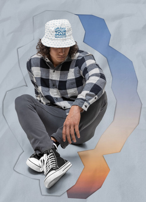 Bucket Hat Mockup Featuring a Man and a Collage-Themed Style