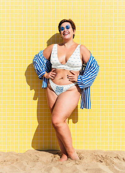Sublimated Bikini Mockup of a Happy Woman Standing in the Sand