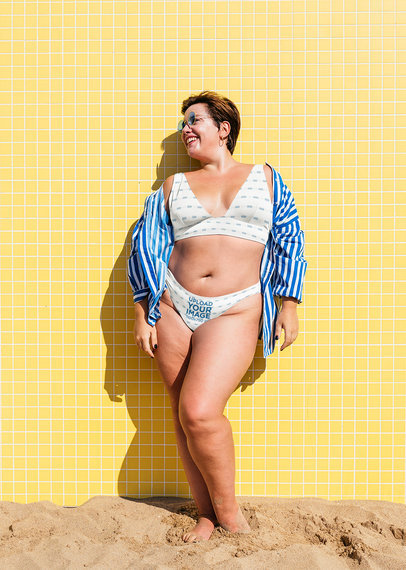 Bikini Mockup of a Happy Woman with Sunglasses Posing in Front of a Tiled Wall