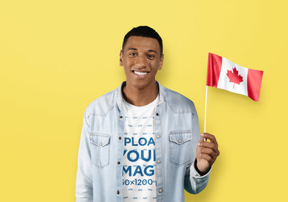 Round-Neck T-Shirt Mockup Featuring a Happy Man Holding a Flag for Canada Day