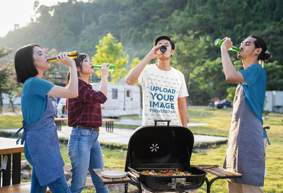 T-Shirt Mockup of a Man Drinking Beer with His Friends and Celebrating Canada Day
