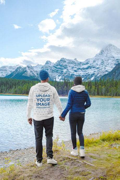 Canada Day-Themed Hoodie Mockup of a Couple Admiring a Natural Landscape 