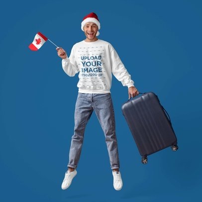 Crewneck Sweatshirt Mockup of a Cheerful Man With a Suitcase Holding a Canadian Flag