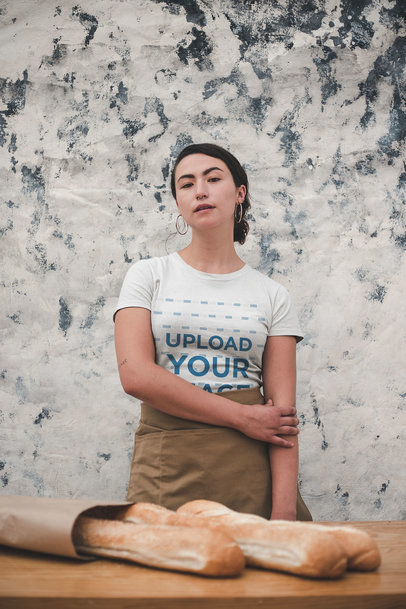 Mockup of a Baker Wearing a T-Shirt and a Waist Apron